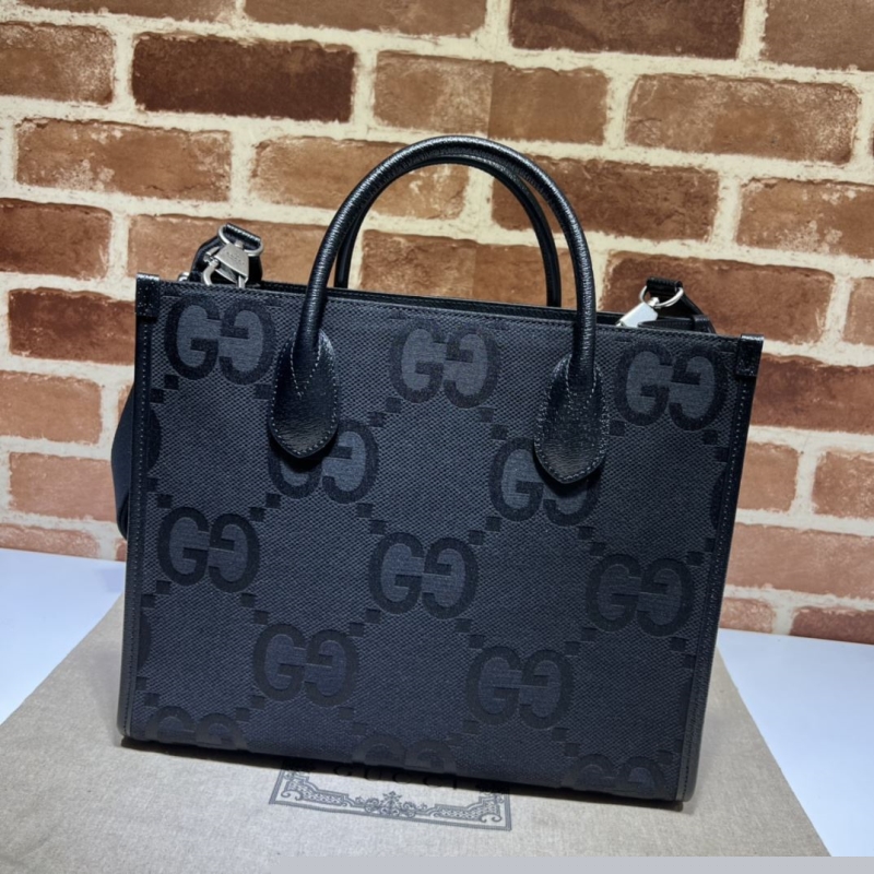 G*u*i shopping bags